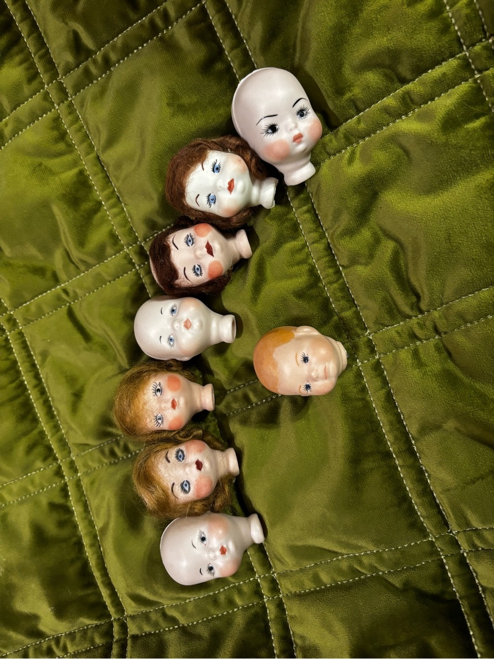 Vintage porcelain doll heads